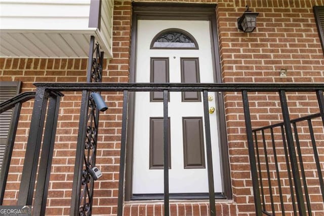 2469 Silver King Dr, Grayson, GA 30017 - doorway to property with brick siding