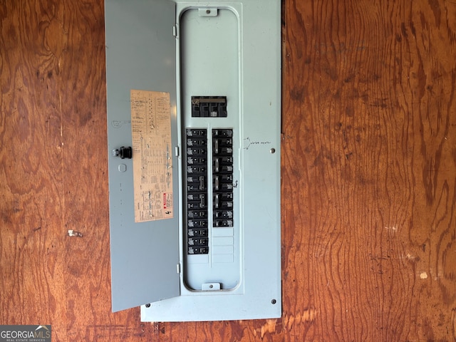utility room featuring electric panel