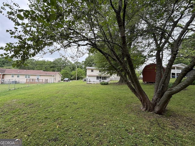 view of yard with fence