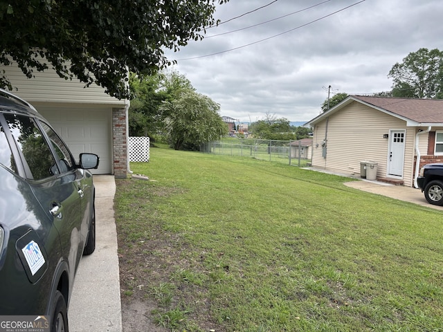 view of yard featuring fence