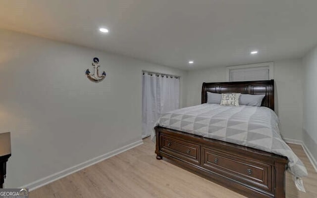 bedroom featuring light wood-type flooring, recessed lighting, and baseboards