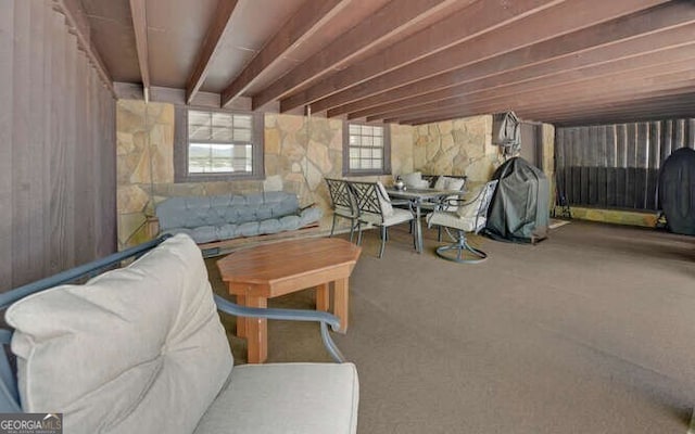 sitting room featuring carpet flooring