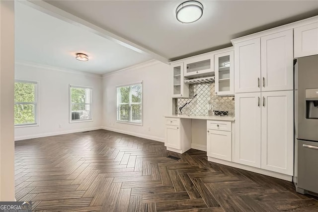 632 Warren Ave, Scottdale, GA 30079 - kitchen featuring crown molding, stainless steel fridge, and a healthy amount of sunlight