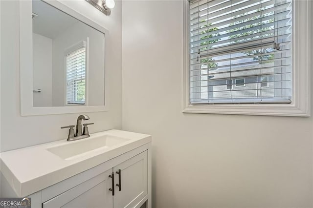 632 Warren Ave, Scottdale, GA 30079 - bathroom with a healthy amount of sunlight and vanity