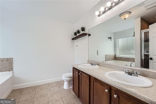 632 Warren Ave, Scottdale, GA 30079 - full bath with double vanity, a bath, tile patterned flooring, and a sink