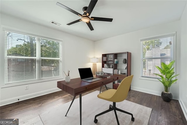 632 Warren Ave, Scottdale, GA 30079 - home office featuring visible vents, baseboards, a ceiling fan, and hardwood / wood-style floors