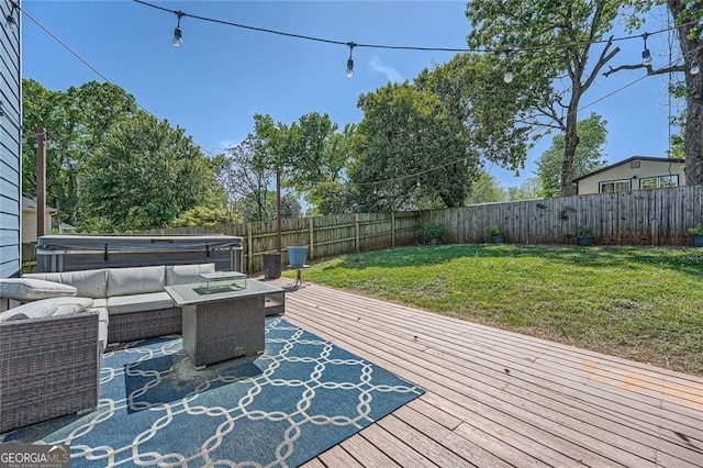 632 Warren Ave, Scottdale, GA 30079 - wooden terrace featuring a fenced backyard, outdoor lounge area, and a lawn