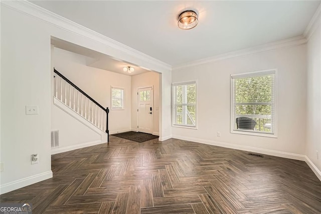 632 Warren Ave, Scottdale, GA 30079 - foyer with crown molding, visible vents, baseboards, and stairs
