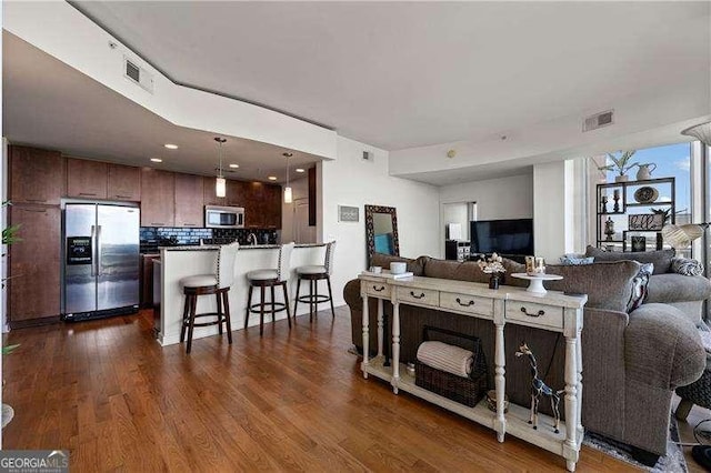 3300 Windy Ridge Parkway SE Unit 1401, Atlanta, GA 30339 - living room with recessed lighting, dark wood-style flooring, and visible vents