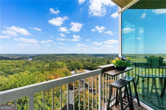 3300 Windy Ridge Parkway SE Unit 1401, Atlanta, GA 30339 - balcony featuring a view of trees