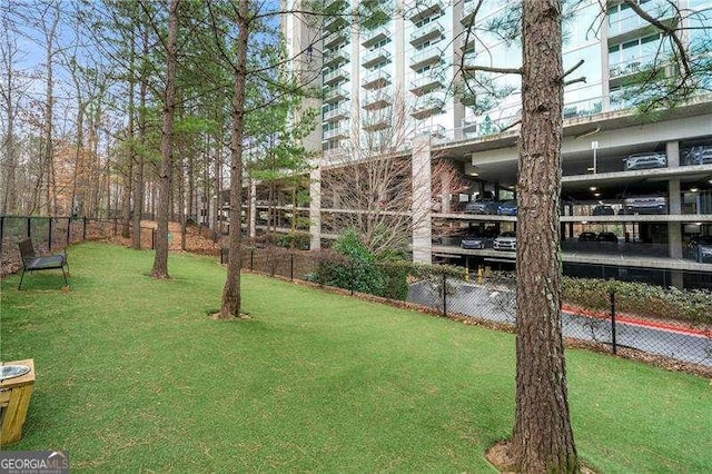 3300 Windy Ridge Parkway SE Unit 1401, Atlanta, GA 30339 - view of yard featuring fence