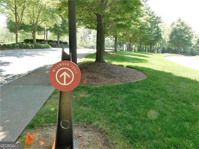 3300 Windy Ridge Parkway SE Unit 1401, Atlanta, GA 30339 - view of property's community featuring a yard