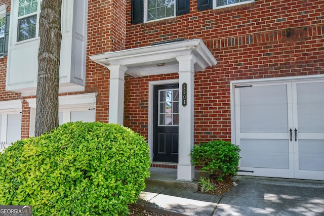 2201 Landing Walk Dr, Duluth, GA 30097 - view of exterior entry featuring brick siding and french doors