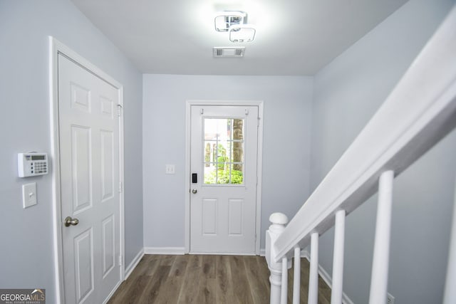 2201 Landing Walk Dr, Duluth, GA 30097 - doorway to outside with visible vents, baseboards, and wood finished floors