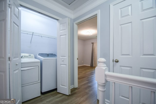 2201 Landing Walk Dr, Duluth, GA 30097 - clothes washing area with laundry area, dark wood-style flooring, baseboards, ornamental molding, and washer and dryer