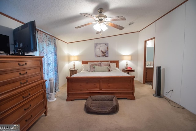 657 Reynolds Rd, Folkston, GA 31537 - bedroom with connected bathroom, ceiling fan, light colored carpet, visible vents, and ornamental molding