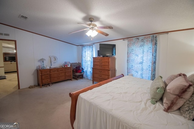 657 Reynolds Rd, Folkston, GA 31537 - carpeted bedroom with a textured ceiling, ornamental molding, visible vents, and lofted ceiling