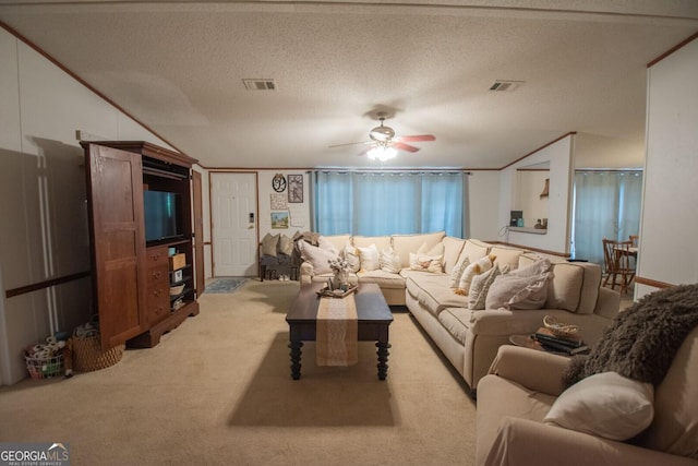 657 Reynolds Rd, Folkston, GA 31537 - living room with light colored carpet, ceiling fan, visible vents, and vaulted ceiling