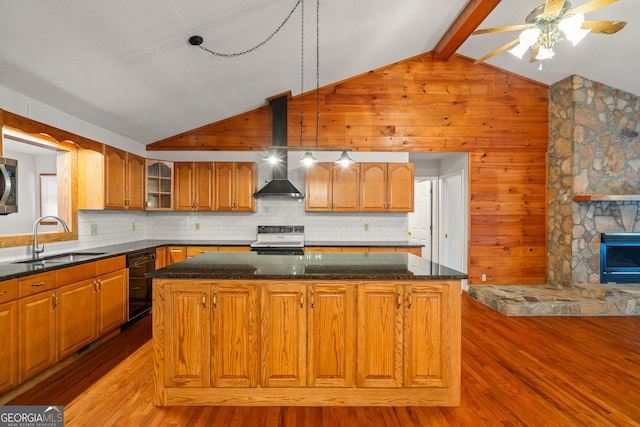 2421 Settlers Ridge Rd, Hiawassee, GA 30546 - kitchen featuring electric range, a kitchen island, light wood-type flooring, decorative backsplash, and wooden walls