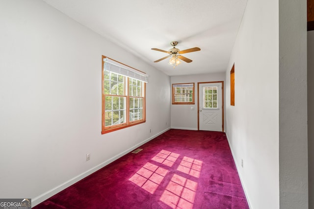 2421 Settlers Ridge Rd, Hiawassee, GA 30546 - empty room featuring healthy amount of natural light, carpet, and ceiling fan