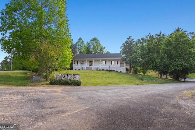 2421 Settlers Ridge Rd, Hiawassee, GA 30546 - view of front of property with covered porch and a front yard