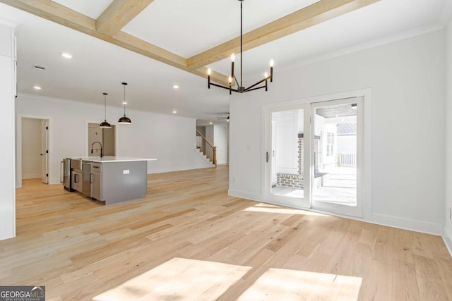unfurnished living room featuring visible vents, ornamental molding, stairs, recessed lighting, and light wood-style flooring