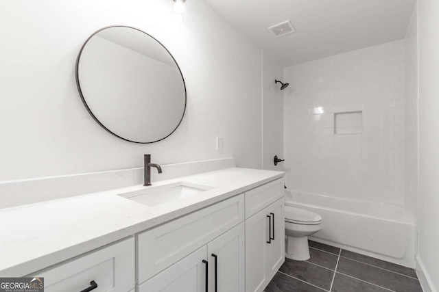 bathroom featuring tile patterned flooring, vanity, toilet,  shower combination, and visible vents