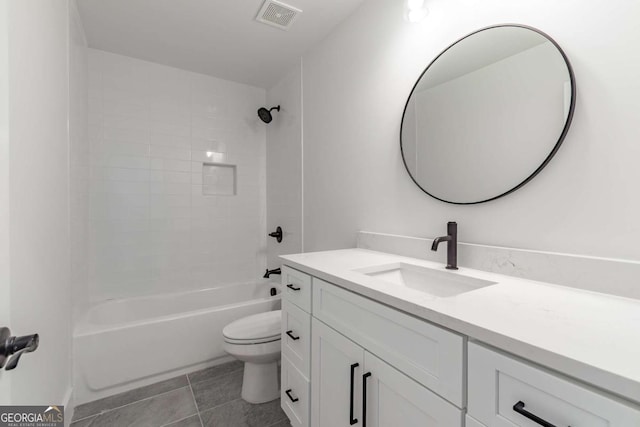 full bath featuring visible vents, vanity, tile patterned floors, toilet, and shower / bathtub combination