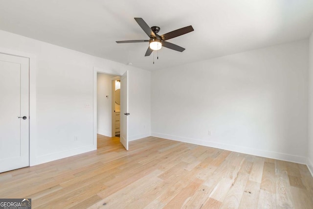 unfurnished bedroom with baseboards, light wood-style floors, and ceiling fan