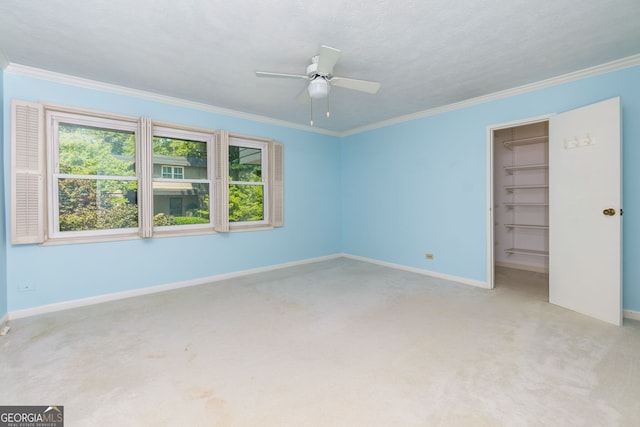 301 Lakemoore Dr NE Unit B, Atlanta, GA 30342 - unfurnished bedroom featuring carpet floors, crown molding, and baseboards