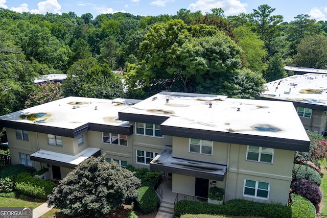 301 Lakemoore Dr NE Unit B, Atlanta, GA 30342 - aerial view with a wooded view