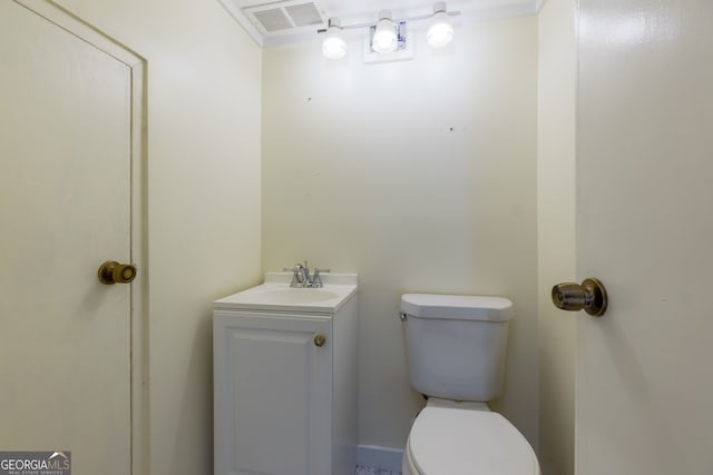 301 Lakemoore Dr NE Unit B, Atlanta, GA 30342 - bathroom featuring toilet, visible vents, and vanity