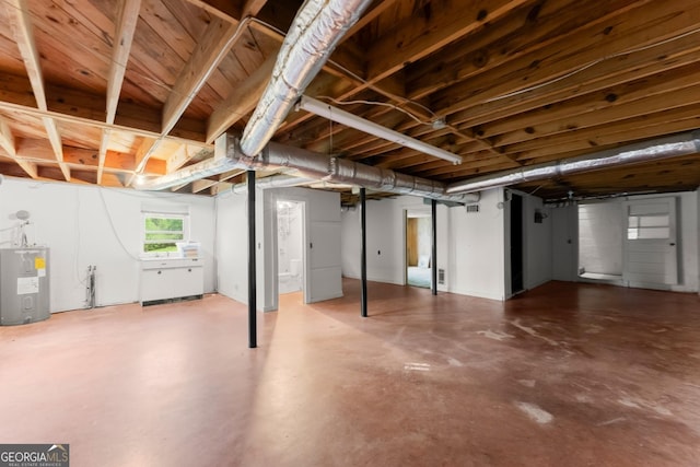 basement featuring water heater