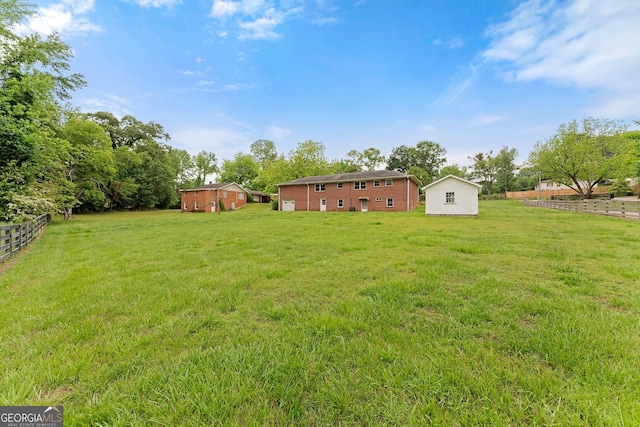 view of yard featuring fence
