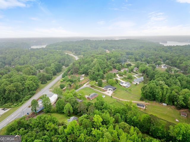 aerial view featuring a view of trees