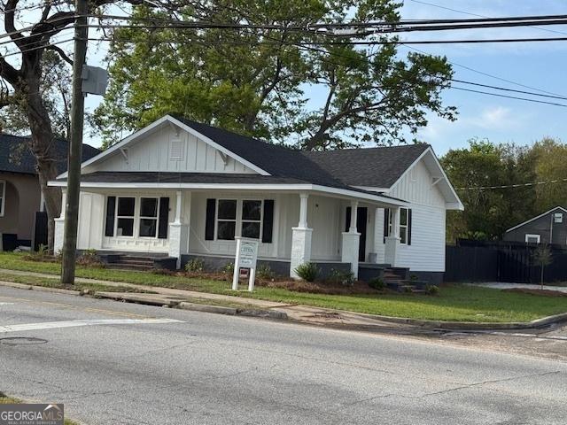 1823 Wrightsboro Rd, Augusta, GA 30904 - bungalow-style home with fence, board and batten siding, and a porch