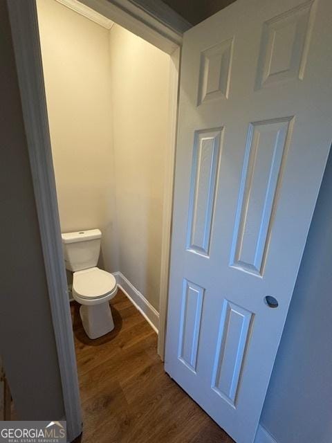 1823 Wrightsboro Rd, Augusta, GA 30904 - bathroom with toilet, baseboards, and wood finished floors