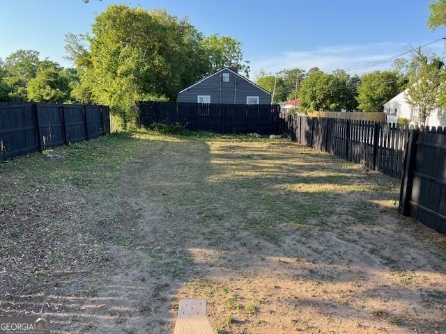 1823 Wrightsboro Rd, Augusta, GA 30904 - view of yard with a fenced backyard