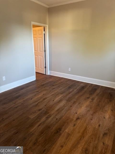 1823 Wrightsboro Rd, Augusta, GA 30904 - unfurnished room with crown molding, baseboards, and dark wood finished floors