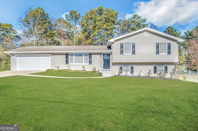 5906 Pine Hurst Way, Douglasville, GA 30135 - split level home featuring an attached garage, fence, driveway, and a front lawn
