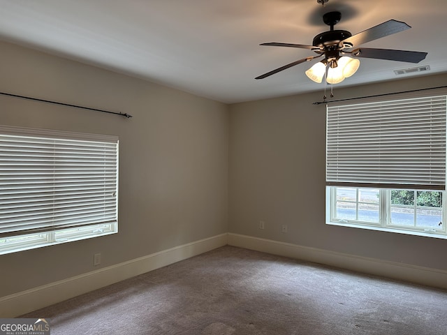 315 N Main St Unit 200, Madison, GA 30650 - carpeted spare room with a ceiling fan, baseboards, and visible vents