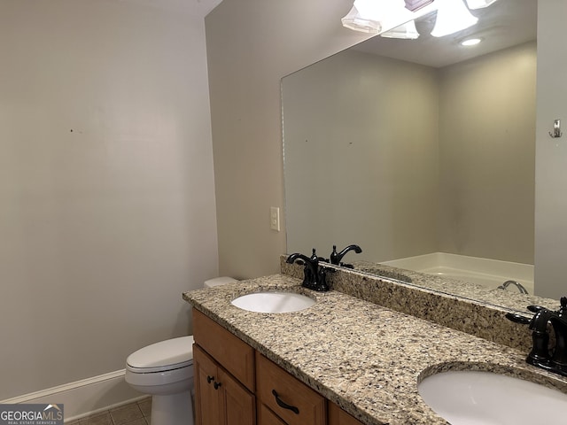 315 N Main St Unit 200, Madison, GA 30650 - bathroom with double vanity, toilet, a sink, and tile patterned flooring