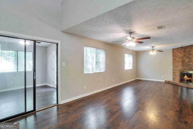 5379 Winslow Xing, Lithonia, GA 30038 - unfurnished living room with baseboards, a ceiling fan, and wood finished floors