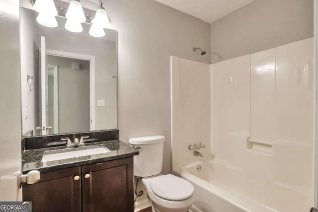 5379 Winslow Xing, Lithonia, GA 30038 - bathroom with vanity, tub / shower combination, and toilet