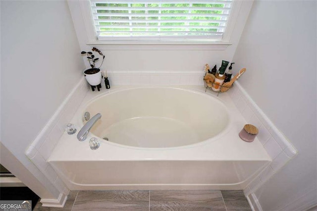 full bath with a bath