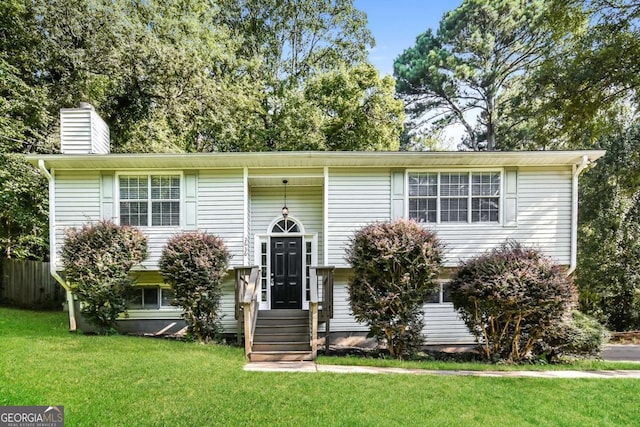 2636 Suzanne Ln, Acworth, GA 30102 - raised ranch with entry steps, a chimney, and a front yard
