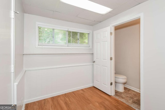 2636 Suzanne Ln, Acworth, GA 30102 - bathroom featuring a paneled ceiling, wood finished floors, and toilet
