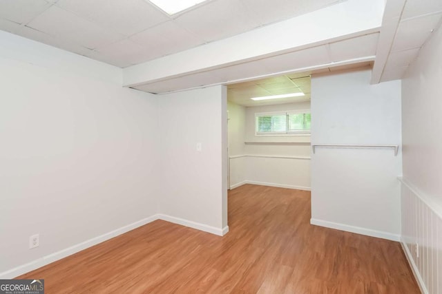 2636 Suzanne Ln, Acworth, GA 30102 - basement featuring baseboards, a drop ceiling, and wood finished floors
