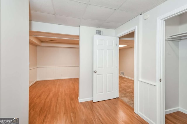 2636 Suzanne Ln, Acworth, GA 30102 - unfurnished bedroom with a paneled ceiling, a closet, wood finished floors, and visible vents
