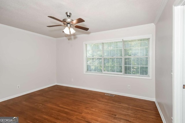 2636 Suzanne Ln, Acworth, GA 30102 - unfurnished room featuring crown molding, ceiling fan, wood finished floors, and visible vents